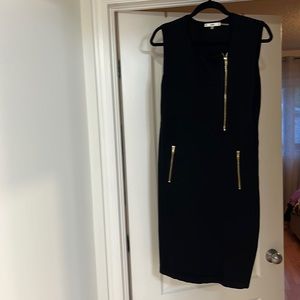 Black dress with gold zippers